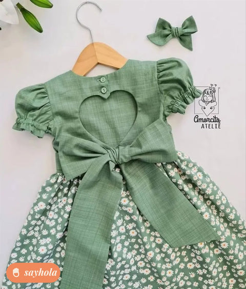 light green baby frock with ribbon detail