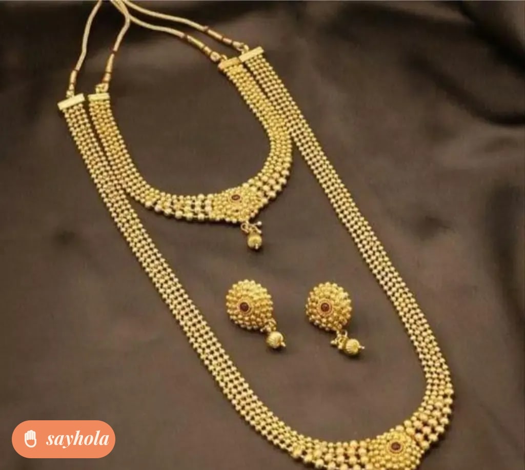 glittering pearl jewellery set with haram and earrings