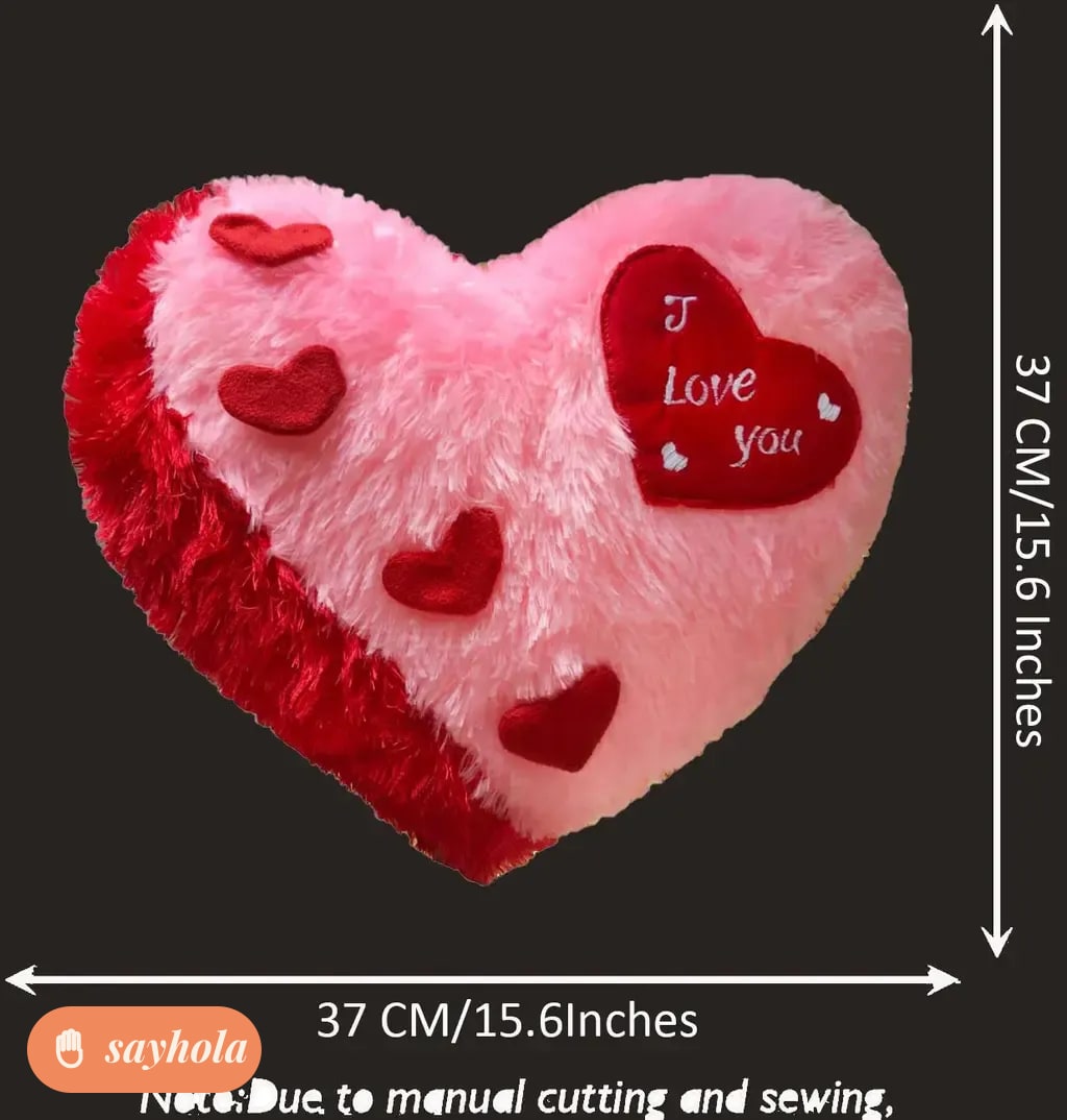 pink heart shape pillow with love message