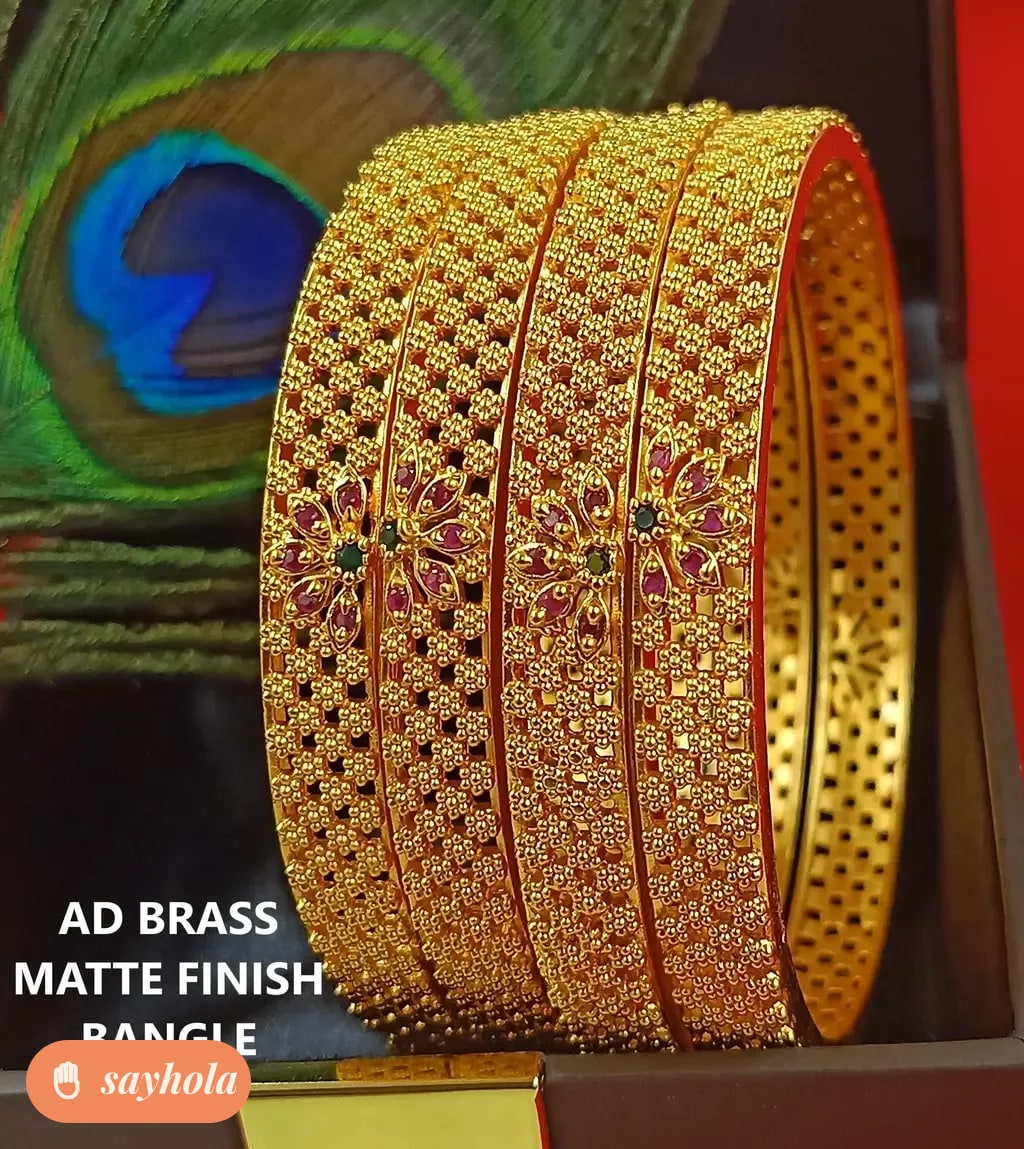 gold plated brass bangle set with ruby stones