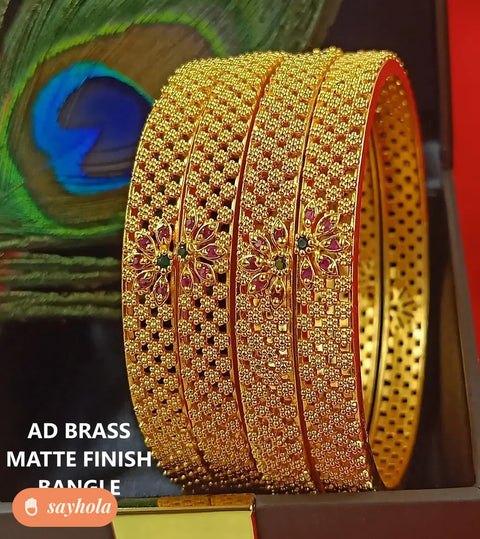 gold plated brass bangle set with ruby stones